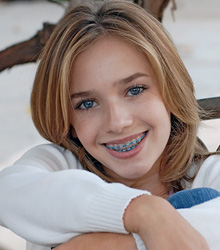 photo of happy girl with braces